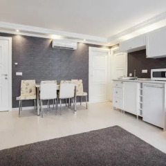 Отель Defne Suites Апартаменты с различными типами кроватей фото 24