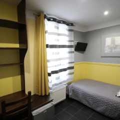 Hotel Des Pyrenees Париж комната для гостей фото 14