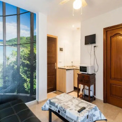 Отель Apartamentos Centro Conil Испания, Кониль-де-ла-Фронтера - отзывы, цены и фото номеров - забронировать отель Apartamentos Centro Conil онлайн удобства в номере