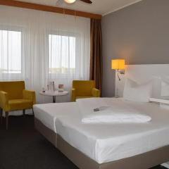 astral Inn Hotel Leipzig Лейпциг комната для гостей фото 3