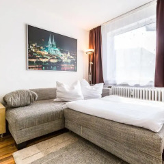 Апартаменты Star Apartments Cologne Кёльн комната для гостей фото 5