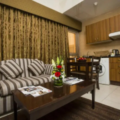 Arabian Dreams Deluxe Hotel Apartments в номере фото 2