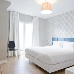 Отель Gloria Design Suites комната для гостей