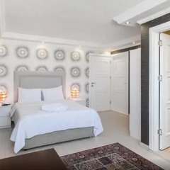 Отель Defne Suites Апартаменты с различными типами кроватей фото 32