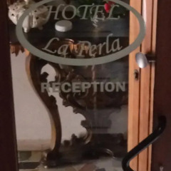 Отель Albergo La Perla питание