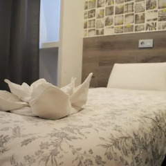 Отель Hostal Abril Стандартный номер с различными типами кроватей фото 13