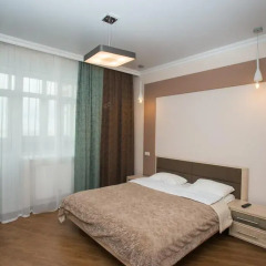 Апартаменты Apartment Malygina Тюмень комната для гостей фото 3
