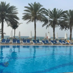 Отель Occidental Sharjah Grand бассейн фото 3