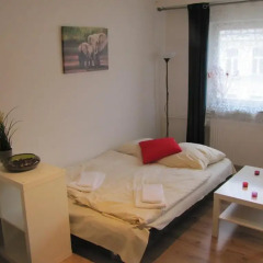 Отель Ferien-zimmer-berlin Wilmersdorfer Straße Берлин комната для гостей фото 11