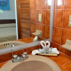 Отель Alba Suites Acapulco ванная