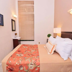 Отель Americana Inn 2* Стандартный номер с двуспальной кроватью (общая ванная комната) фото 7
