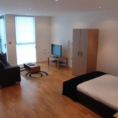 Апартаменты Quay Apartments Солфорд комната для гостей фото 4