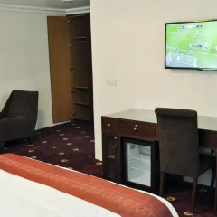 Отель Caledonian Suites удобства в номере