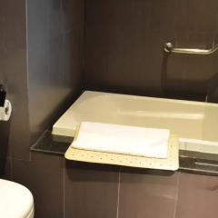 Отель Golden Tulip Mandison Suites 4* Номер Делюкс фото 9