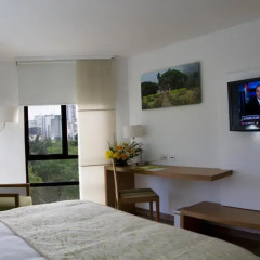 Отель Cosmos Cali 3* Улучшенный номер с различными типами кроватей фото 7