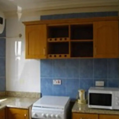 Апартаменты Calabash Green Executive Apartments Тема в номере