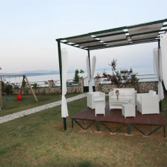 Отель Beachfront Barbati Villas пляж фото 2