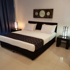 Отель East Suites Улучшенный номер с разными типами кроватей фото 5