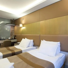 Отель GK Regency Suites 4* Номер Бизнес с различными типами кроватей фото 3