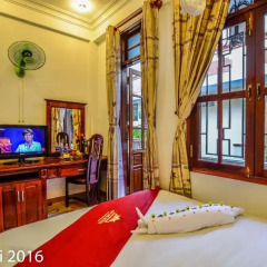 Отель Nhi Nhi 3* Номер Делюкс фото 2