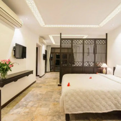 Отель Hoi An Ancient House Resort And Spa 4* Стандартный семейный номер с различными типами кроватей фото 3