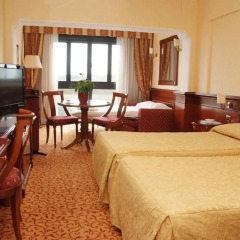 Отель Atahotel Villa Pamphili 4* Стандартный семейный номер с двуспальной кроватью