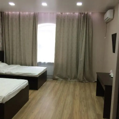 Гостиница Postoyaliy Dvor Inn в Уссурийске отзывы, цены и фото номеров - забронировать гостиницу Postoyaliy Dvor Inn онлайн Уссурийск комната для гостей фото 2