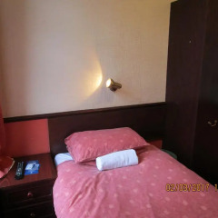 Отель Trentham Guest House сейф в номере