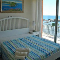 Отель Taorminaxos wonderful seaview Таормина комната для гостей фото 5