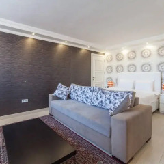 Отель Defne Suites Номер Делюкс с различными типами кроватей фото 10