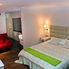 Отель Apartamentos El Caserio комната для гостей фото 5