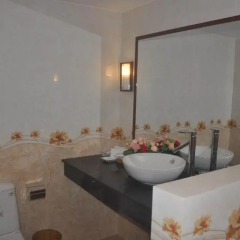 Отель Tra Que Riverside Homestay 2* Улучшенный номер с различными типами кроватей фото 7