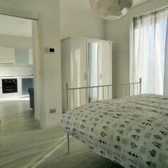Отель Marco Green House Беллинцаго-Ломбардо сейф в номере