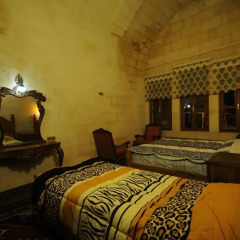 Отель Kardesler Cave Suite комната для гостей