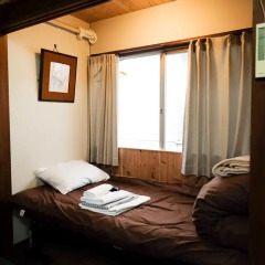 Отель Kotobuki Global Inn Кровать в женском общем номере фото 2