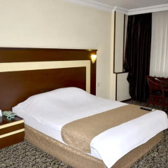 Hotel Tilmen комната для гостей