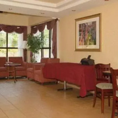 Отель All Seasons Inn and Suites интерьер отеля