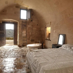 Отель Sextantio Le Grotte Della Civita 4* Улучшенный номер фото 2