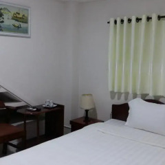 Отель CoCo Riverside Homestay Хойан комната для гостей фото 2