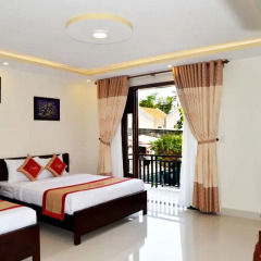 Отель NuNi Hoi An Homestay 2* Стандартный семейный номер с двуспальной кроватью фото 2