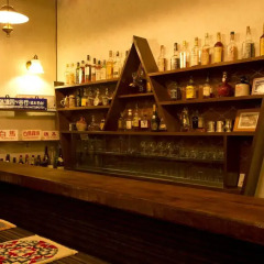 Отель Grove Inn Skala Хакуба гостиничный бар