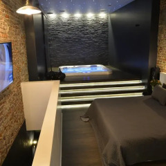 Отель Chambre Avec Jacuzzi Sauna Privatif Улучшенные апартаменты фото 27