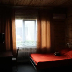 Mini-hotel Ekonomnaya Derevnia Бердянск комната для гостей фото 2