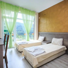Отель Kaltsunova house Банско комната для гостей фото 5