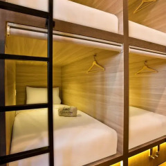Capsule Pod Boutique Hostel Кровать в общем номере фото 10