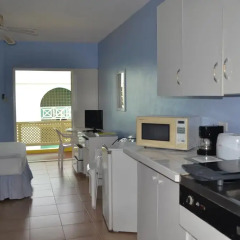 Отель Meridian Inn в номере