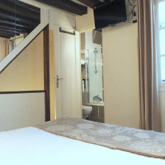 Отель Louvre Parisian Chicsuites комната для гостей фото 5