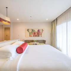 Отель Ramada by Wyndham Phuket Deevana Patong Номер Делюкс с двуспальной кроватью фото 11