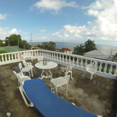 Отель Tina's Guest House Ямайка, Монастырь - отзывы, цены и фото номеров - забронировать отель Tina's Guest House онлайн балкон