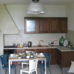 Отель Holiday Home Cannubi in Barolo Здание Barolo в номере